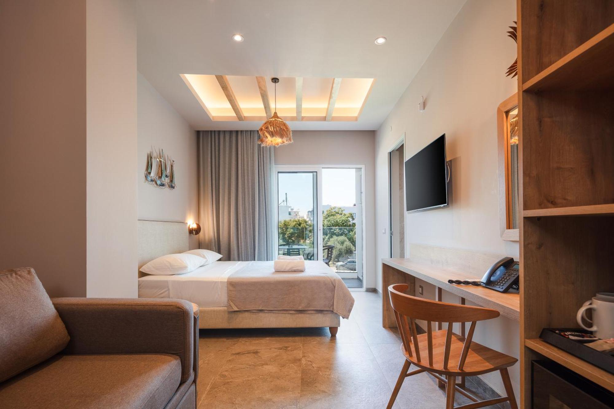 Skipper Beachfront Suites Hersonissos  Habitación foto